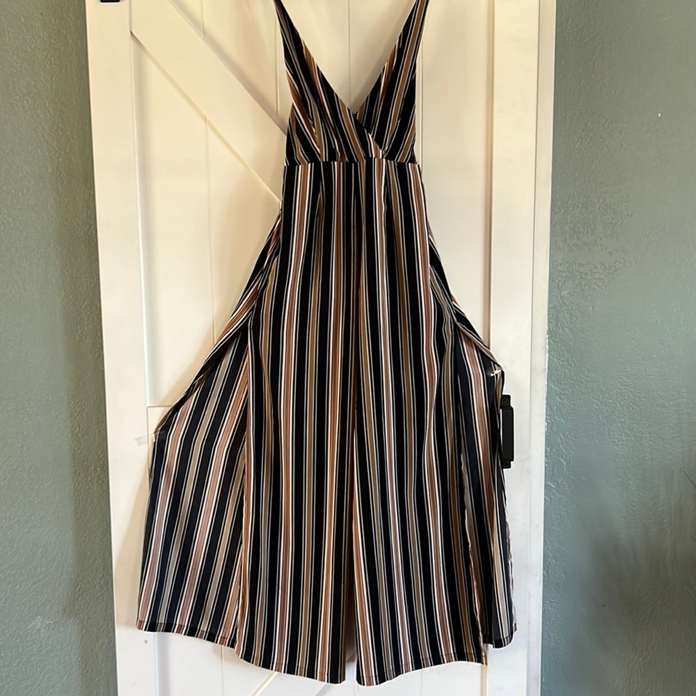 Dark blue stripped romper with slits on the side size medium